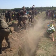 Возле Запорожья похоронили 57 неопознанных бойцов, погибших на Донбассе Возле Запорожья похоронили 57 неопознанных бойцов, погибших на Донбассе